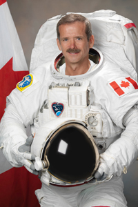 Photograph official portrait of Canadian Astronaut Chris Hadfield in EMU suit. Photo Date: July 19, 2011. Location: Building 8, Room 183 - Photo Studio. Photographer: Robert Markowitz